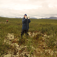 A volunteer collecting data on the Arctic's soil