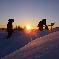 Earthwatch volunteers digging in the snow (Credit: Shawn Brown)