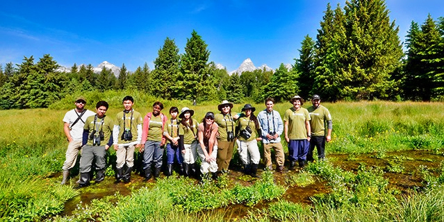 a group of Earthwatch volunteers posing for a photo in the Rocky Mountains.