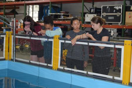 The fellows test the hydrophones they built. (Courtesy WHOI)