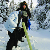 Earthwatch volunteers measuring snow pack (Credit: Elaine Spence)