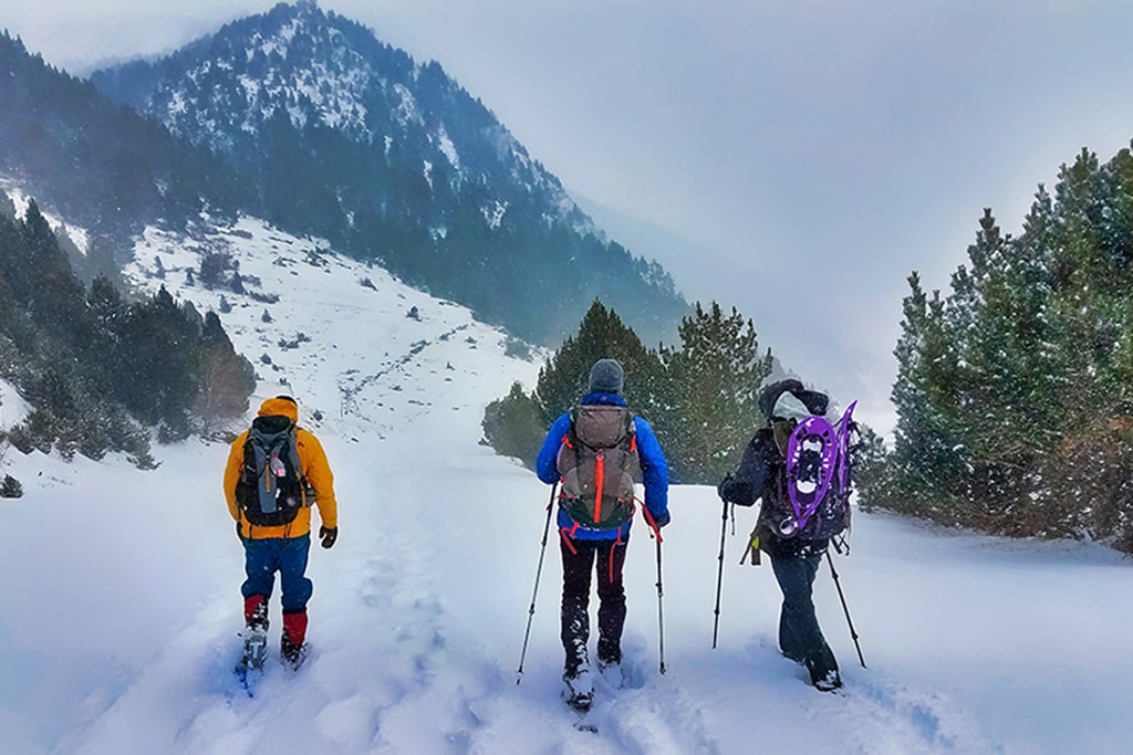 Three people skiing in Andorra.