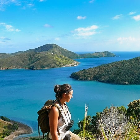 A woman hiking in the U.S. Virgin Islands.