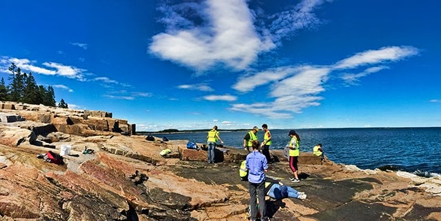 A group of students on an expedition on the coast of Acadia National Park.