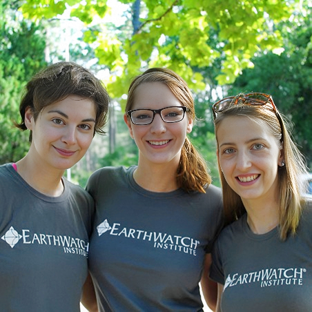 Three women in Earthwatch tshirts.