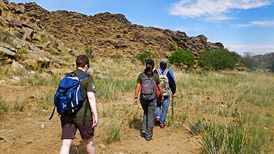 Earthwatch volunteers hike to the survey site in Mongolia.