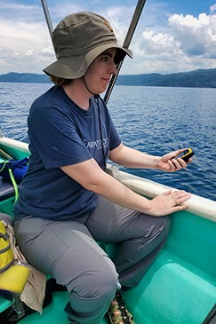 An Earthwatch volunteer monitors a cetacean’s GPS location.