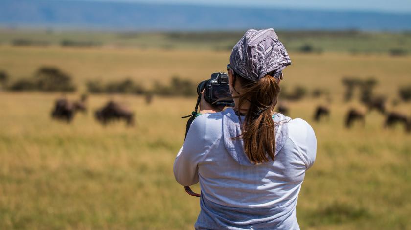 volunteer surveying kenyan wildlife