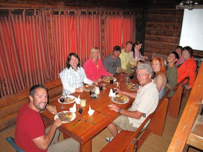 Volunteers enjoying a group dinner after a long day of fieldwork (credit Bianca Bodeker)