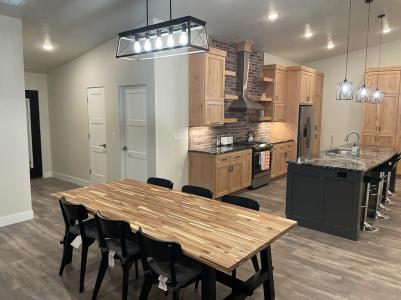 The kitchen/dining area at the rental home. Photo credit: https://www.airbnb.com/rooms/46283136 