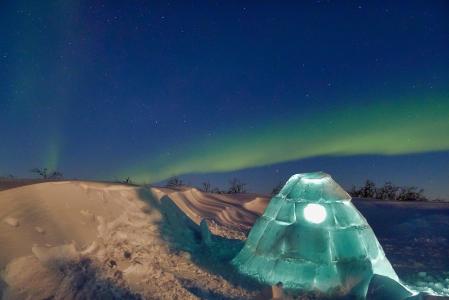 In winter, the northern lights appear over Churchill, Canada.