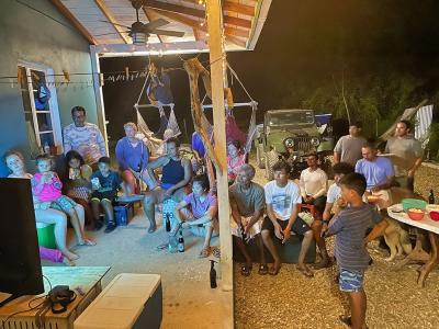 Earthwatch volunteers watching the episode of PBS’ Changing Seas our team was featured in, with our local team in Belize.