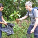 An Earthwatch volunteer collects a plant sample (C) Dana Salomon